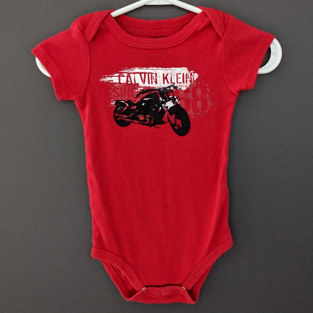 **3/$25**Calvin Klein red short sleeved motorcycle onesie